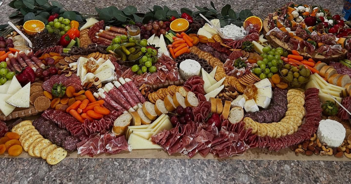 Elegant wedding grazing table by Nina's Graze Co