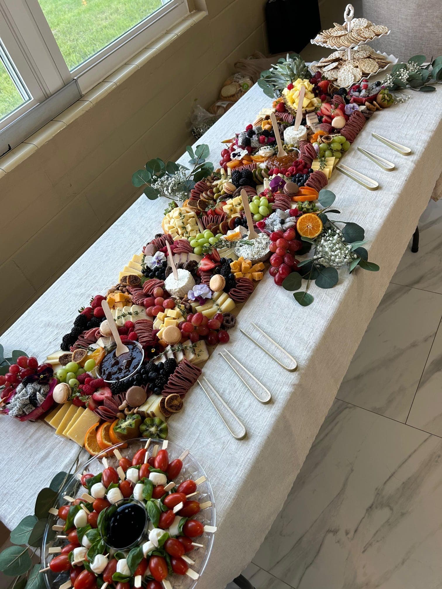 Full grazing table spread by Nina's Graze Co